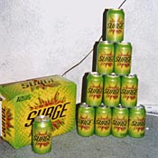 A collection of SURGE cans.