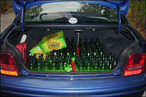 A car with a trunk full of SURGE soda.